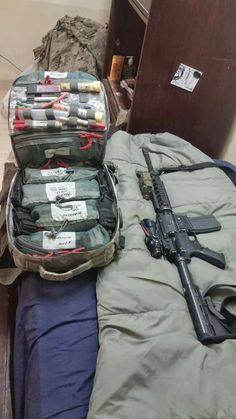 Combat medic bag next to his protection. 68 Whiskey Combat Medic, Field Medic Aesthetic, Army Combat Medic, Medic Bag, Navy Corpsman