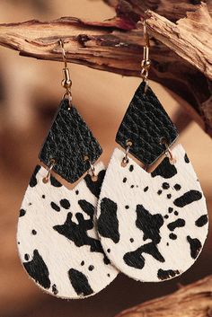 These Cow Print Earrings provide an eye-catching addition to any wardrobe! These Cow Print Earrings make a stylish statement, adding an eye-catching aesthetic to any outfit. Cow Print Earrings, Handmade Leather Jewelry, Diy Leather Earrings, Leather Jewelry Diy, Western Earrings, Black Cow, White Jewelry, Hanging Earrings, Leather Projects