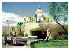 an old photo of a giant statue in front of a store with cars parked outside