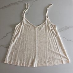 Madewell Soft Cotton Crop Tank With Adjustable Straps! Never Worn! In Excellent Condition! Seamless Casual Camisole For Vacation, Casual Everyday Spring Camisole, Casual Seamless Camisole For Vacation, Simple Beige Tops For Summer, Simple Beige Summer Tops, Trendy Cream Tank Top For Summer, Seamless Tops For Spring Vacation, Casual Cream Tank Top For Beach, Casual Beige Tank Top For Everyday