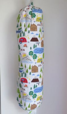 a baby sleeping bag hanging on the wall