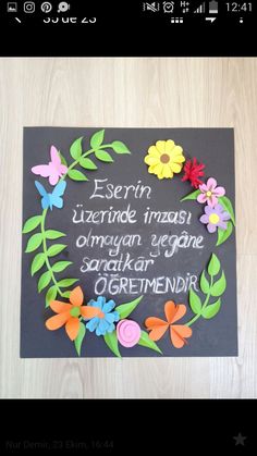 a blackboard with flowers and words written on it that says sern uternide imasi origan vegane sanatar