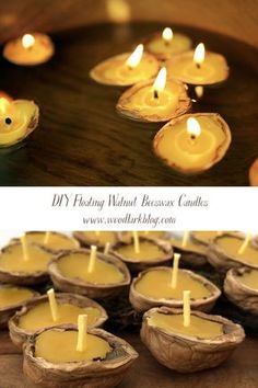 some candles are sitting in wooden bowls on a table