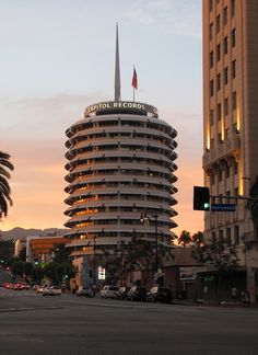 a tall building sitting next to a traffic light