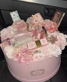 a pink box filled with lots of different items