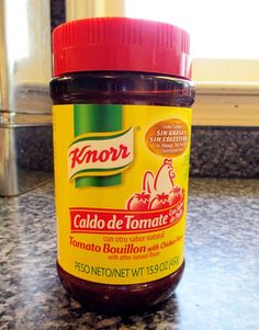 a jar of ketchup sitting on top of a counter