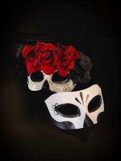 Embrace timeless elegance with this Red Rose Floral Mask, featuring intricate embroidery and vibrant red roses. Inspired by Venetian mask-making traditions, this stunning mask is perfect for masquerade balls, themed parties, or theatrical events. The luxurious red floral accents combined with the delicate embroidery make this mask a captivating statement piece. Age Group/Gender - Adult/Women Size/Type - One size fits all adults Mask Color - Red/White Mask Material - Polyresin Special Features - Luxury Masks For Costume Party, Luxury Traditional Masks For Costume Party, Luxury Red Masks And Prosthetics For Masquerade, Traditional Luxury Masquerade Mask For Costume, Luxury Traditional Masquerade Mask For Costume, Luxury Red Masquerade Masks And Prosthetics, Luxury Traditional Masquerade Mask For Parties, Skull Mask Flowers, Queen Of Hearts Face Mask