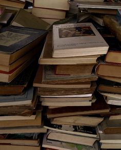 a pile of books sitting on top of each other