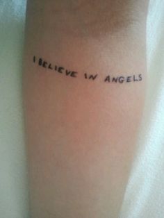 a tattoo with the words i believe in angels written on it