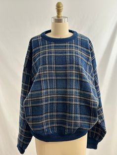 This 90s vintage sweater is one of my favorites. In a blue, white, black, gray plaid design,  it also has a round collar, with a great fit. Wear with an ankle length denim a black boot or gray joggers and sneakers for a cool street style vibe. -Vintage 90s -Minimalist plaid design -Machine wash recommended Measurements: marked a mens large *Sleeve 21  inches *Bust 25 inches *Length 25 inches *Bottom opening 16 inches  *Please note this item is pre loved and there may be minor flaws to the garment. Not to worry if there is anything major we will let you know. --Returns will not be accepted. I encourage you to ask questions for additional pictures, measurements, etc.-- Vintage Sweaters Men, Vintage Sweaters 90s, Cool Street Style, Vibe Vintage, Gray Joggers, Retro Sweater, Grandpa Sweater, Grey Joggers, Sweater Vintage