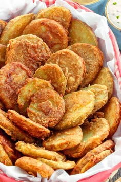 some fried food in a basket on a table