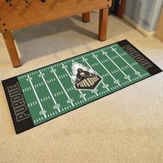 Always be at the field with Sports Licensing Solutions Football Field Runner Mat. With the same design as your favorite teams actual field you can always be with your team even at home. At 30 inches tall by 72 inches long this mat is perfect for any game room, man cave, or next to your bed. The carpet is a soft nylon so that is can hold up against moderate to high foot traffic. To make sure that the mat last for years we have used vinyl for the backing and then serged the edges of the mat. Made Colorado Buffaloes Football, Game Room Man Cave, Purdue Boilermakers, Colorado Buffaloes, Purdue University, Nylon Carpet, Military Academy, University Of Colorado, Football Field