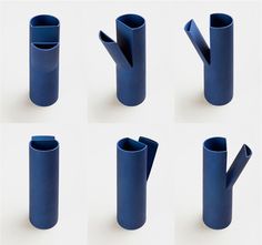 six blue vases are shown in different positions