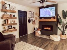 a living room with a fire place and television