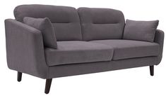 a gray couch with two pillows on it