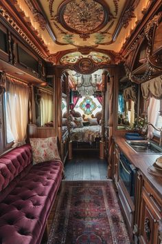 the interior of an old train car with wood trimmings and ornate decorations on the ceiling