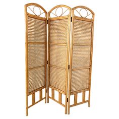 a wooden room divider with an intricate design