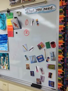 a white board with magnets on it in front of a bulletin board that says what you need