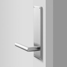 an image of a door handle on a white wall