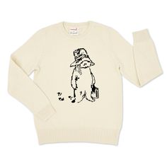 Introducing the adult version of our beloved Paddington Coming and Going Sweater! Inspired by the timeless illustrations in A Bear Called Paddington, this sweater captures the heartwarming essence of the iconic little bear from Peru with his suitcase and big hat.  Made from 100% cotton, this unisex long sleeve sweater has a soft hand and comfortable fit. The mid-weight knit is seasonless and not bulky. Whether you're relaxing at home, strolling through the city, or embarking on your own exciting journey, the Paddington Coming and Going Sweater wraps you in warmth, nostalgia, and a touch of magic. This adult sweater pairs perfectly with our kids Paddington Coming and Going Sweater for a matching set sure to bring smiles and cherished memories: https://www.etsy.com/listing/1242553331/padding Classic Cream Cotton Sweater, Bear Sweater, Paddington Bear, Big Hat, Ivory Sweater, Little Bear, Wrap Sweater, Red Hats, Kids Sweater