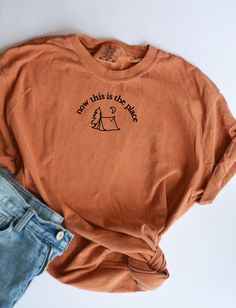 This embroidered camping tshirt is the perfect tee to add to your outdoorsy closet! Featuring an original embroidered design. It is soft and perfect for those adventurous days camping, driving in your van, gardening, hiking, for exploring the outdoors. This tshirt is unisex and tends to run true to size for men and runs a bit oversized for women. This tshirt is a perfect gift for nomads, campers, hikers, nature lovers, gardeners, and outdoor adventurers.  These are made to order and designed and produced in Colorado. Please specify which color thread you want prior to check out. You will be able to choose between black or white thread. Want the thread in a different color? Feel free to message me!  Crewneck is made with 50% cotton, 50% polyester and features a high quality embroidered desi Trendy Tshirt Designs, Outdoorsy Shirt, 2024 Clothes, Camping Tshirt, Faith Based Clothing, Camping Tee, Hiking Tshirt, Hiking Shirt, Nature Shirts