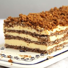 a piece of cake sitting on top of a blue and white plate