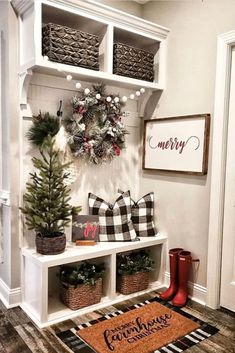 the entryway is decorated for christmas with wreaths and decorations