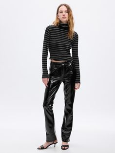 Fit: A full-length slim fit with a mini bootcut leg. ​ Fabric: 100% Polyester.  Stretch: No-Stretch Pants.  Rise: Mid Rise Jeans.  Look: A classic five-pocket pant in vegan patent leather.  Details: Zip fly & five-pocket styling.  Our Mid Rise Jean has a 10" 25 cm) rise. ​ Slim through the hip & thigh.  Mini bootcut leg. ​​ 17. 5" 44 cm) leg opening.  Full-length jean Inseam: Petite 27. 5" 67. 5 cm), Short 28. 5" 72 cm), Regular 30" 76 cm), Long 32" 81 cm), Tall 34″ 86 cm).  Models wearing Gap Flare Black Pants, Boot Pants, Jeans Look, Bloomers Shorts, Bootcut Jean, Leather Baby, Burberry Jacket, Stretchy Jeans, Black Vegan