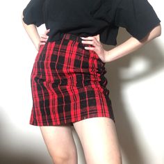 Vintage 1960s or 1970s quilted mini skirt.  Black and red handmade quilted tartan mini skirt with back zip. Unlined, some small threads coming loose, consistent with age and fact that it was cut from raw material. Colors still vibrant, lots of life left.  Fits like a perfect modern size 8.  15 inch waist  18.5 inches long  20 inches wide at hips Fitted Plaid Mini Skort, Retro Plaid Mini-length Bottoms, Retro Plaid Mini Bottoms, Fitted Plaid Skort For Winter, Plaid Cotton Mini Bottoms, Plaid Cotton Mini Skort, Plaid Cotton Mini Skirt Skort, Plaid Cotton Skort For Fall, Plaid Cotton Mini Skirt