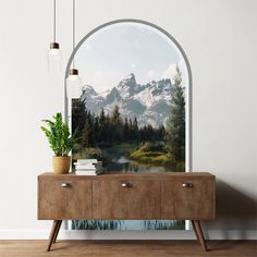 an arched window with a view of the mountains and trees in front of it is shown