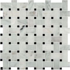 a white and black mosaic tile pattern with squares on it's sides, in the middle