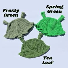 three crocheted hats with the words frosty green, spring green and tea leaf