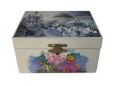 this is an image of a box with princesses and castle scenes on the lid