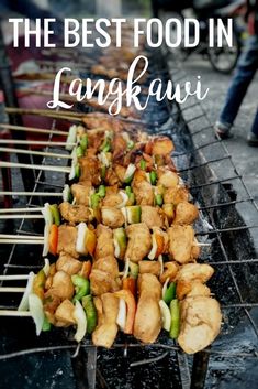 the best food in langkawi is served on skewers with vegetables and meat