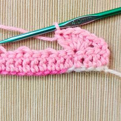 the crochet stitch is being worked on