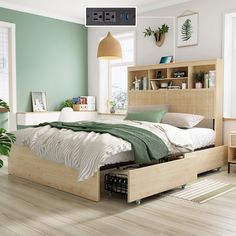 a bed sitting in a bedroom next to a book shelf filled with lots of books