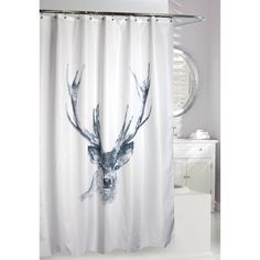 a shower curtain with a deer head on it