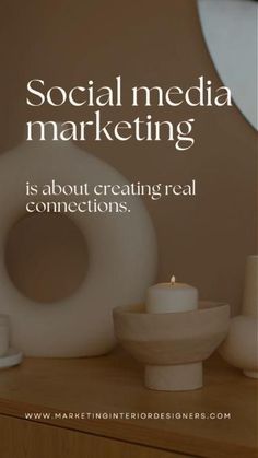 a wooden table topped with white vases and candles next to a mirror that says social media marketing is about creating real connections