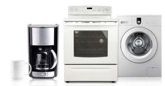 an appliance and coffee maker sitting next to each other on a white surface