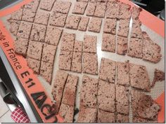 some brownies that are on top of an orange and black tray with the words rage in front of them