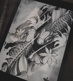 a black and white drawing of a koi fish with flowers on it's side