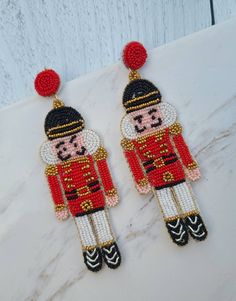 pair of beaded nutcracker earrings