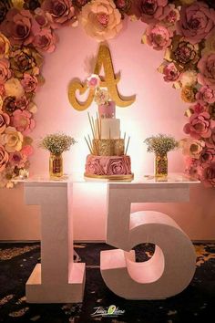 an image of a table with flowers on it and the number fifteen in front of it