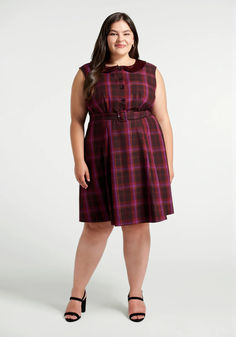 Made from a woven fabric and covered throughout in our exclusive sugar plum plaid print, this gorgeous A-line dress presents in sumptuous shades of red, burgundy, and lavender with shimmering sinews of metallic gold. Boasting cap sleeves, a Peter Pan collar, and ornate golden button-up closure with pearly accents at the fitted bodice, a high-rise waistline with a matching and removable belt, and a twirly swing skirt complete with thoughtfully-placed darts and handy side pockets. Plus Size Vintage Clothing, Designer Plus Size Clothing, Modcloth Style, 2010s Fashion, Plaid Outfits, Vintage Inspired Dresses, Sugar Plum, Red Burgundy, Fit N Flare Dress