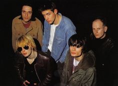 five young men are posing for a photo