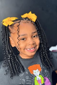 This whimsical and imaginative crochet hairstyle for kids showcases a collection of long, twisted crochet braids that offer both texture and fullness. Adorned with vibrant yellow bows, the hair is partially tied up at the crown, allowing cascading curls to frame the face while also displaying a fun and youthful updo. Perfect - Click to see more of Fun and Creative Crochet Styles for Kids: 21 Ideas to Inspire You and follow us for more hairstyle ideas. // Photo Credit: Instagram @monacastyles_ Youthful Updo, Afro Kids Hairstyles, Cascading Curls