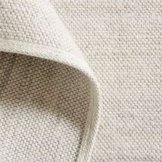 the textured fabric is white and beige