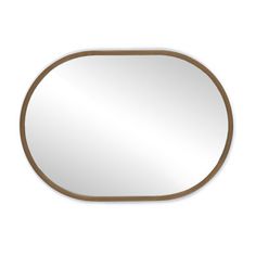 an oval mirror on a white wall with a brown frame and wood trim around the edges