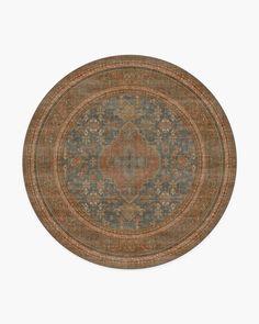 an orange and blue area rug on a white background with a circular design in the middle