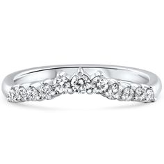 a white gold wedding ring with five diamonds